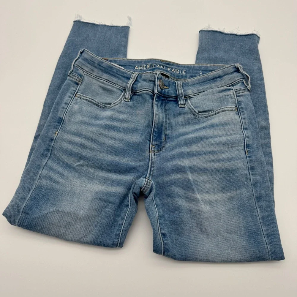 American Eagle‎ Super Stretch Jegging Light Wash Raw Hem Jeans Women Size 4